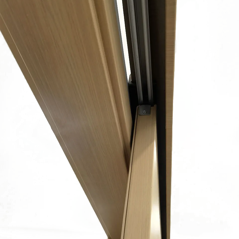 Puerta corrediza de acero tipo granero con paneles con rejilla