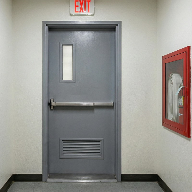 Puerta de salida de emergencia con rejilla inferior Puerta de salida de emergencia con rejilla inferior